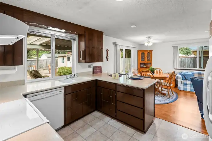 The eat-in kitchen is open to the family room for easy entertaining.