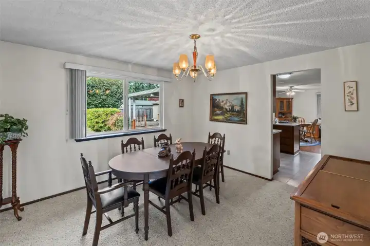 Formal dining for special occasions...or knock out the wall and expand the kitchen.