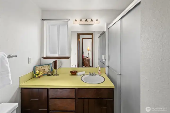 Bath off primary includes an easy-access shower.