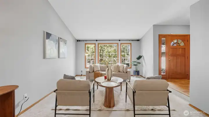 Offering vaulted ceilings and expansive windows creating a bright, welcoming atmosphere.