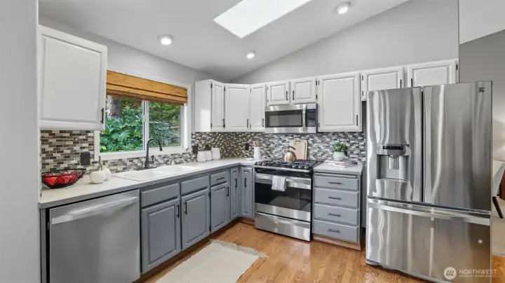 Cook under the glow of natural light with a skylight brightening your kitchen space.