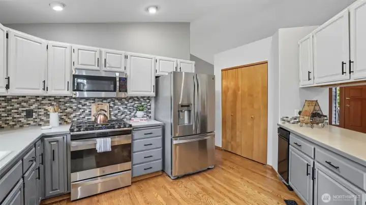 Plenty of storage with pantry access and abundant cabinet space.