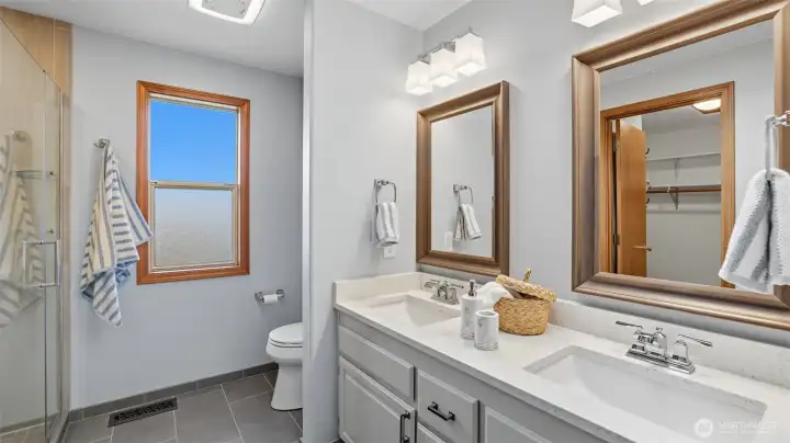 A serene primary ensuite designed for both function and relaxation.