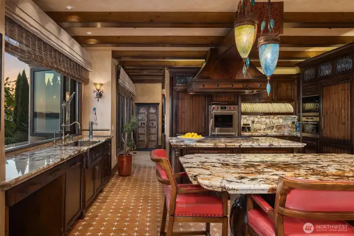 A chef's kitchen has two Islands.
