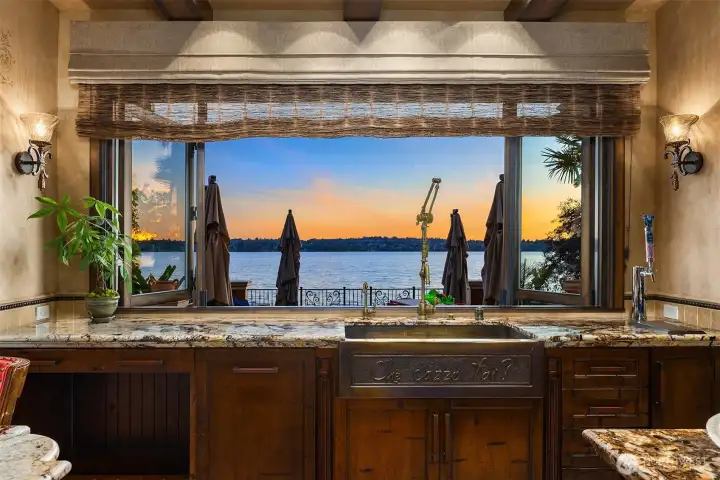 The kitchen features a Nana window perfect for serving your guests.