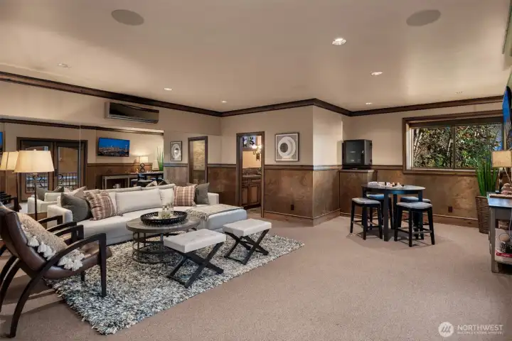 Flexible living space above the garage is great for a theatre...