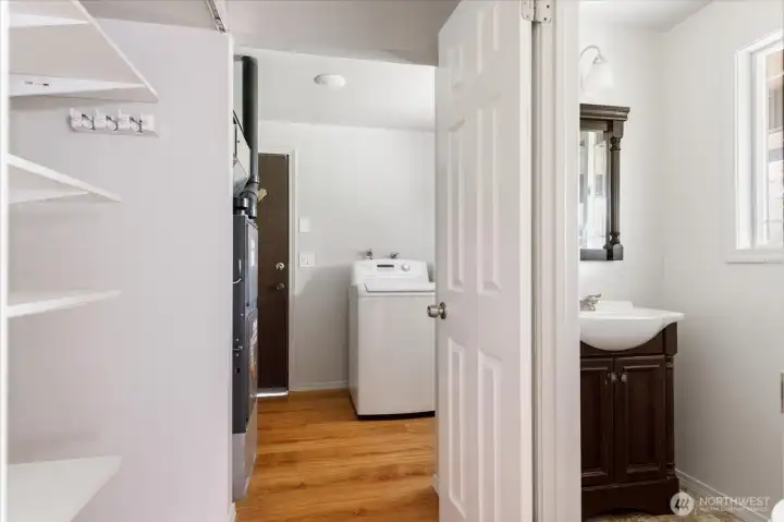 Powder bathroom between utility &vdining