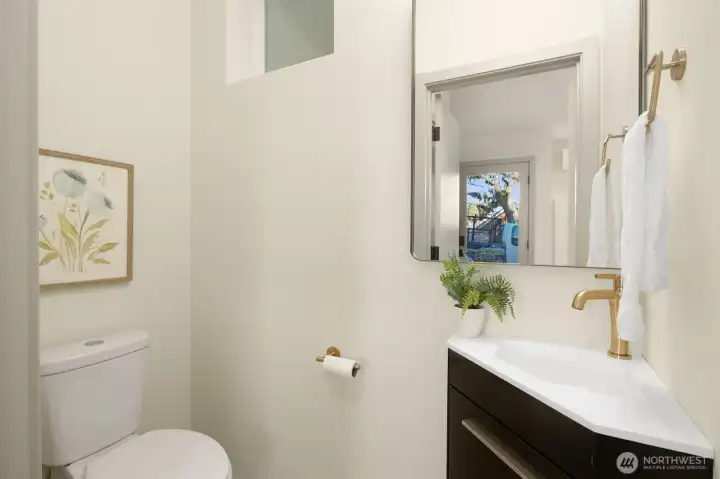 Modern bathroom featuring a clean white aesthetic and high-quality plumbing fixtures.