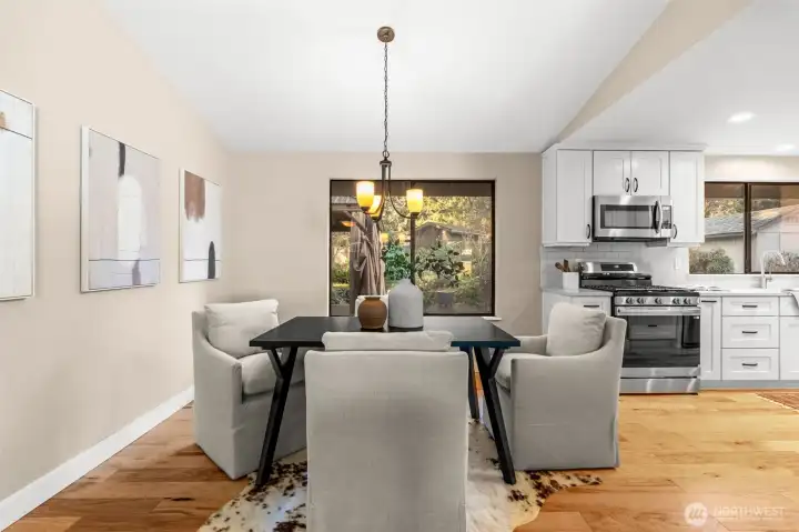 The dining area is nicely placed in between the living room and kitchen to deliver seamless transition for cooking or entertaining.