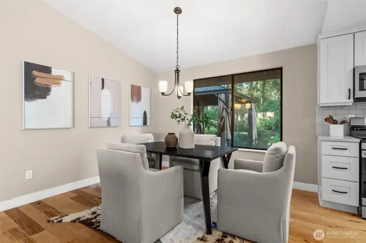 Cozy yet spacious dining area right off the kitchen makes serving and enjoying meals effortless, keeping food hot from pan to plate.