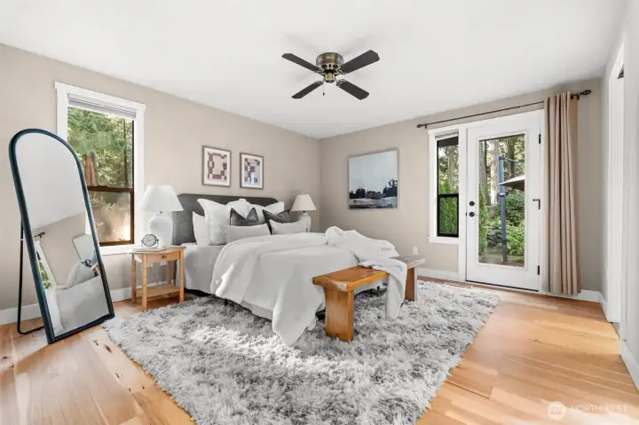 Private backyard access directly from the primary bedroom, offering seamless indoor-outdoor living and a tranquil retreat.