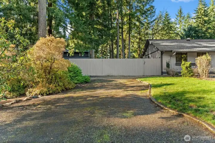 Bonus large driveway, big enough for an RV and backyard access.