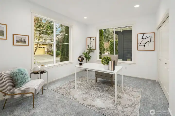 Spacious main floor bedroom (staged as an office)