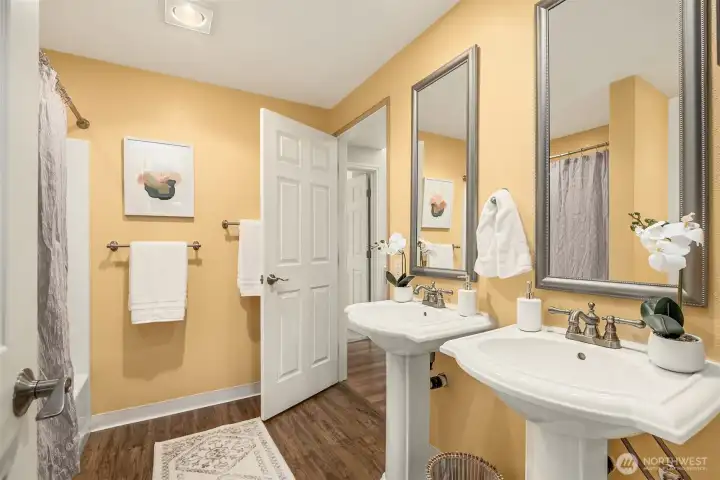 Full bath is updated on the upper level with 2 pedestal sinks and full tub/shower