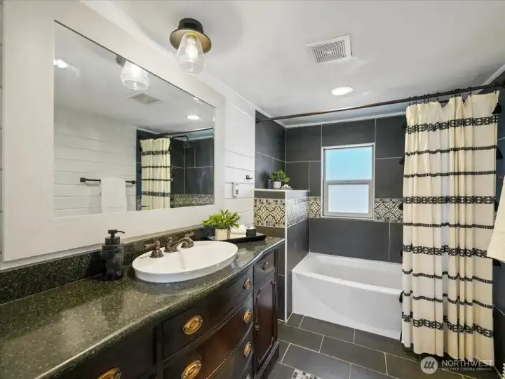 Stunning updated bathroom on the upper floor