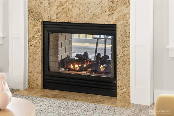Double Sided Fireplace extends to the Outside Deck