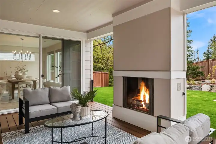 Outdoor enhancements include an extended gas line for deck entertaining, improved drainage, new retaining wall, poured concrete side yard, and double-gated access—supporting both function and flow.