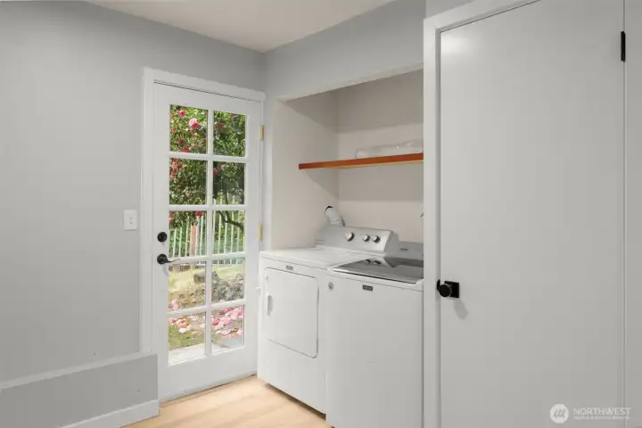 Utility room with access to patio
