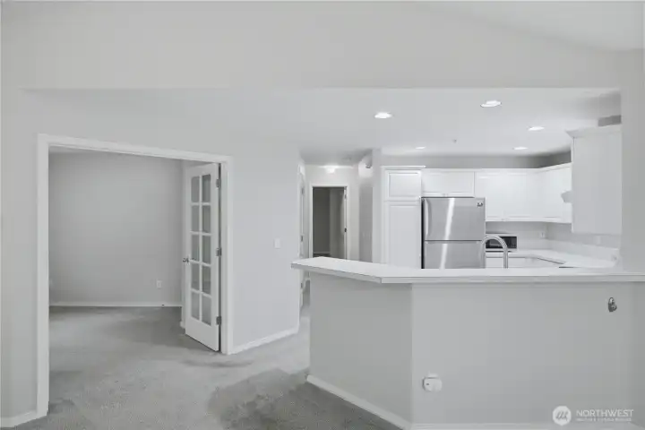 Kitchen and first room of three