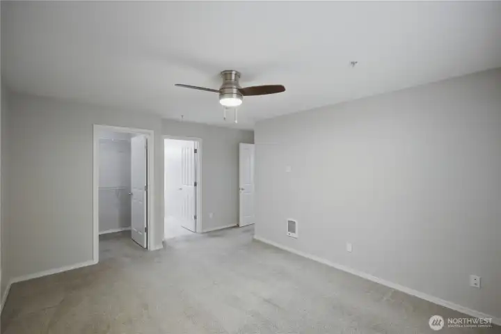Primary room with bathroom and walk in closet