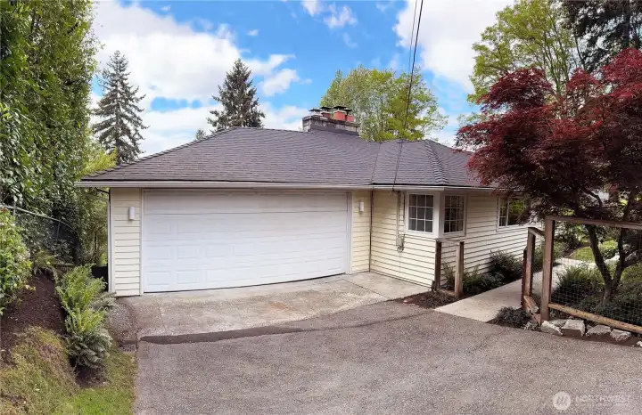 Enjoy the two car garage  and driveway.