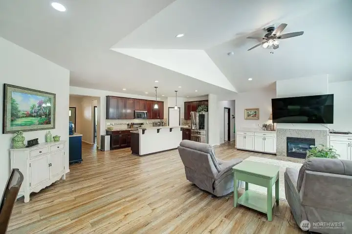 View from dining room to kitchen and living room. View from dining room to kitchen and living room.