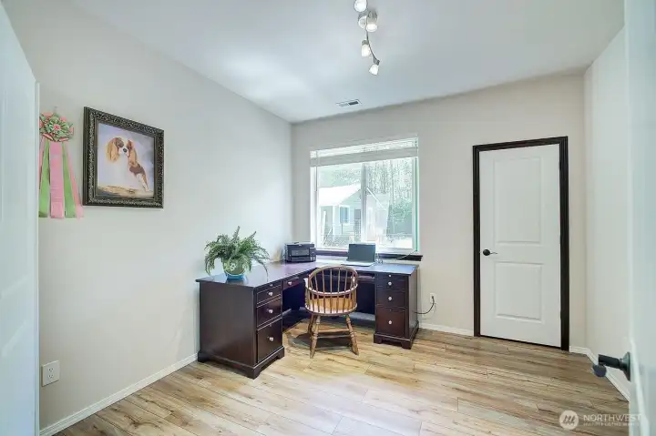 Right off the primary suite, french door lead to a 5th bedroom with walk in closet and views of the backyard. Right off the primary suite, french door lead to a 5th bedroom with walk in closet and views of the backyard.