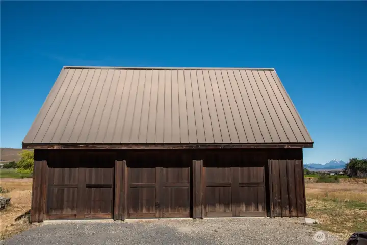 32x24 multipurpose garage/shop building with a finished upstairs space, 3/4 bath