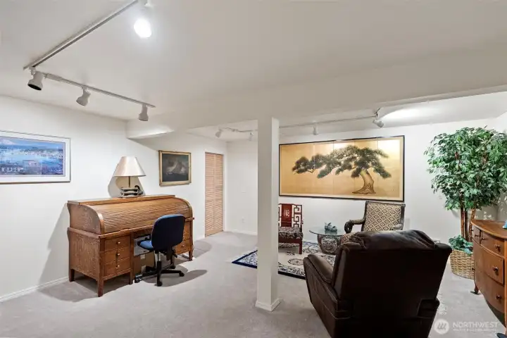 The lower level of this condo features a spacious, versatile flex room that offers endless possibilities for customization. Whether you envision a home office, a cozy den, a fitness area, or a hobby space, this adaptable room accommodates your lifestyle needs perfectly. Conveniently, the garage provides direct entry into this room, allowing for seamless transitions and easy access when arriving home with groceries or gear.