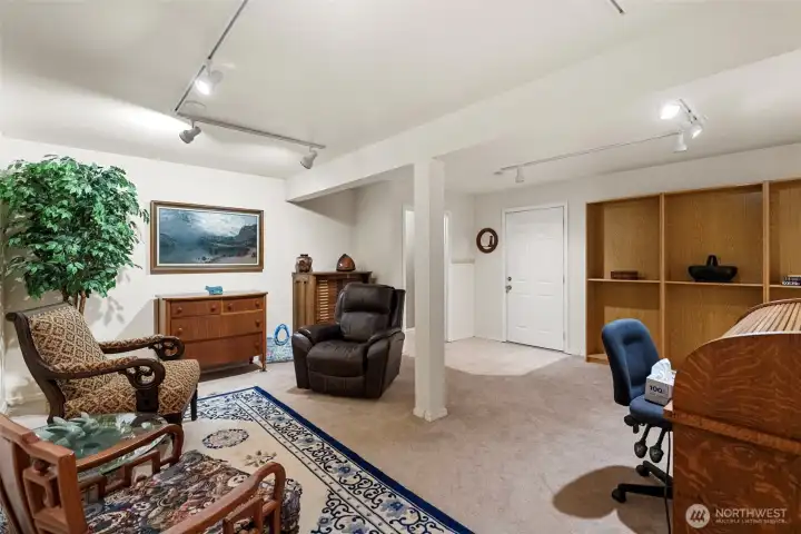 Another view of the flexible lower level room. This versatile space is perfect as a home office, guest suite, hobby room, or media center—the possibilities are endless!