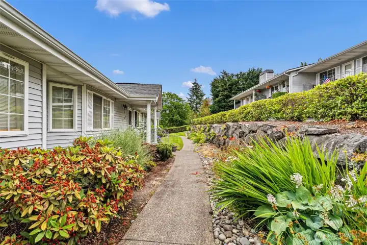 Sidewalk leading to the front door of 3812 Snyder Lane, Unit 15B.
