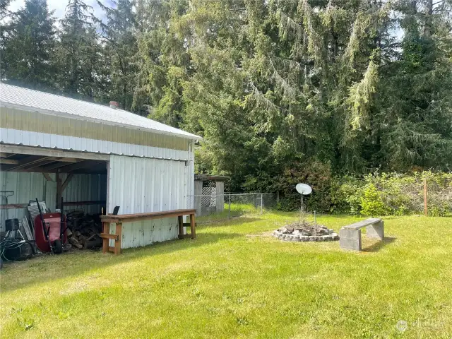 Large wood shed and fire pit for those summer nights on the coast!