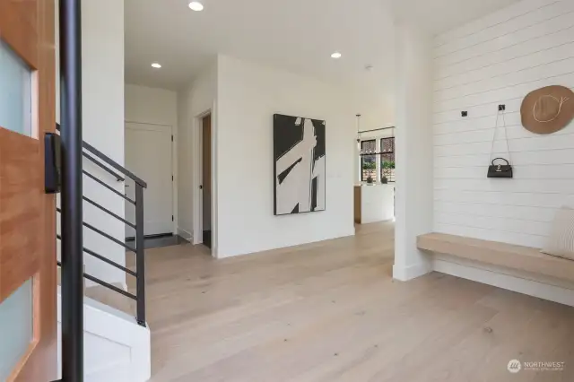 Spacious Entry with Open Ceiling to Upper Level, Built-In Bench