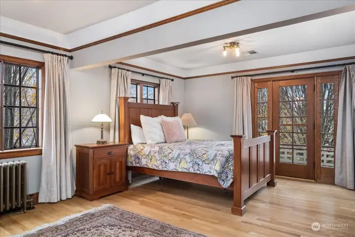 Primary suite - door to 2nd floor balcony viewing backyard Primary suite - door to 2nd floor balcony viewing backyard