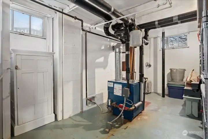 Basement - storage area and updated boiler for radiant heat Basement - storage area and updated boiler for radiant heat