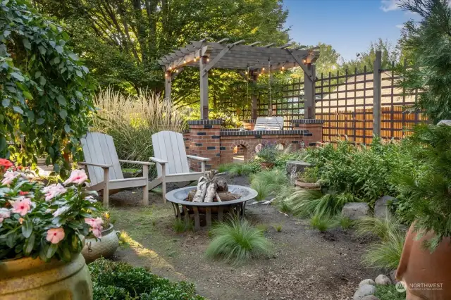 Very private backyard with swing and fire pit