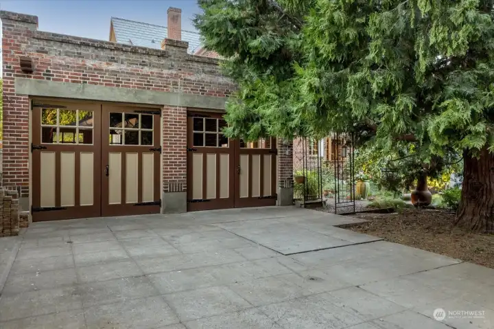2-car garage accessed from side yard - EV hookup 2-car garage accessed from side yard - EV hookup
