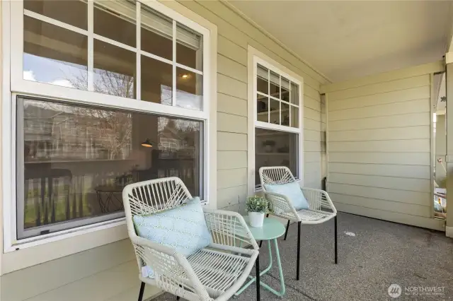The covered front porch provides welcoming space to enjoy the neighborhood.