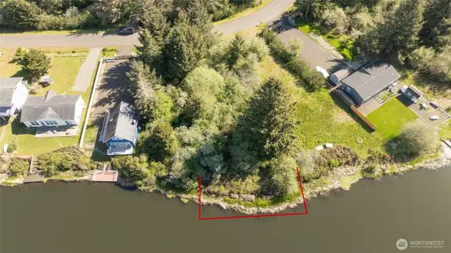 A view from the canal side looking back towards the road.  Red line is Approximate location of the lot.