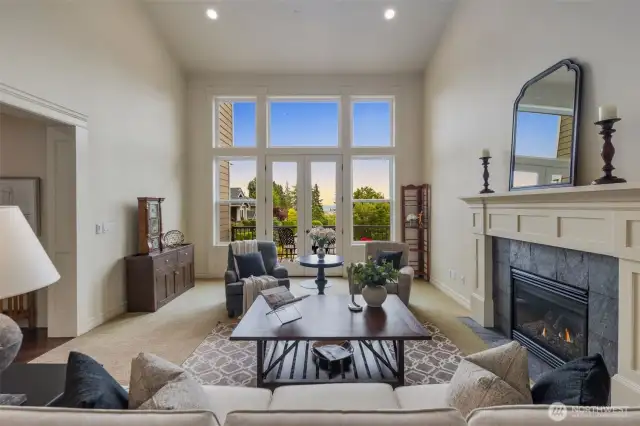 Living room with gas insert and some Puget Sound view.