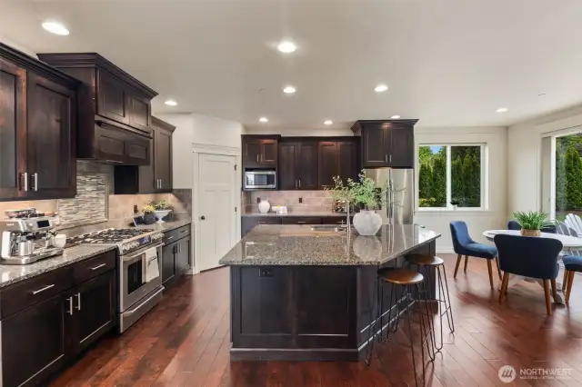 Stainless steel appliances and high-end finishes.