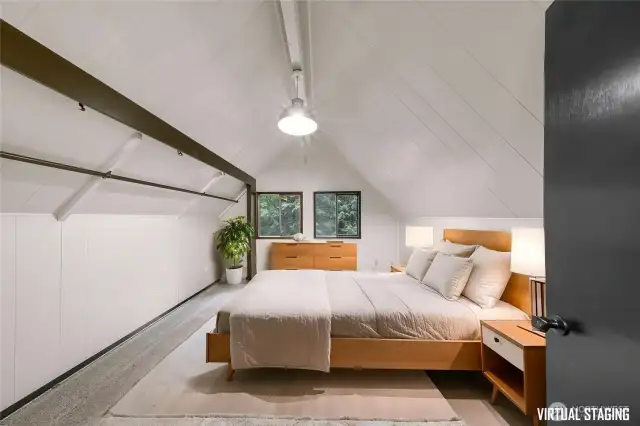 Upstairs has been virtually staged three different ways (family room, office, or primary bedroom)