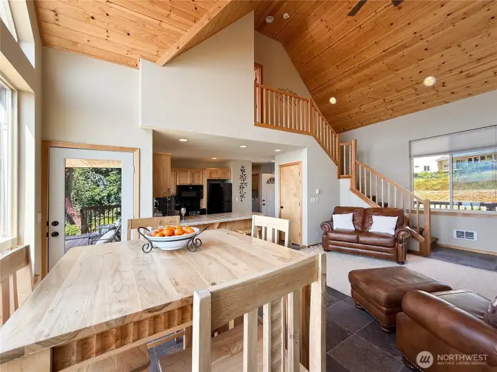 Slate floors and wood ceilings bring a natural feel.