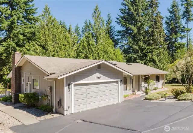 Situated on a shy acre in a quiet, serene setting just minutes from Silverdale, this 3-bedroom + den, 1.75-bath rambler offers both comfort and personality.