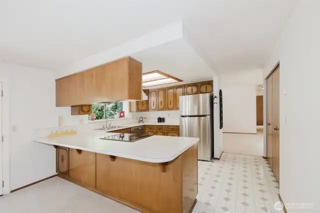 You will always feel connected with plenty of space for your guests to gather around while you cook