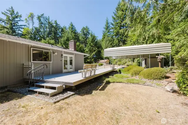 Set on a shy acre of serene Northwest beauty, there’s plenty of space to garden, relax, or entertain outdoors.