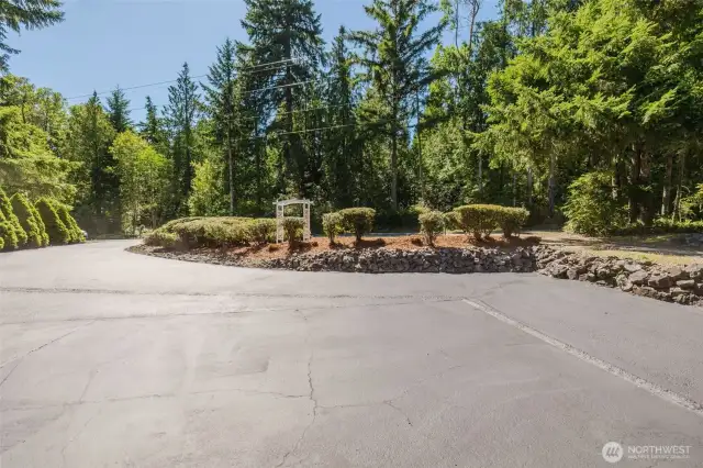 Freshly sealed drive, leads to the two car attached garage.