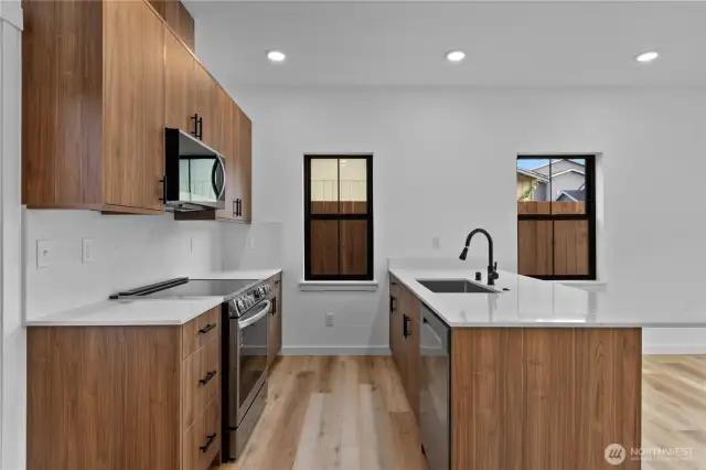 Walnut cabinets & island in kitchen