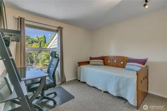 The second bedroom has been used as an office. It, too, has a great, territorial view of the front area and receives much afternoon light!