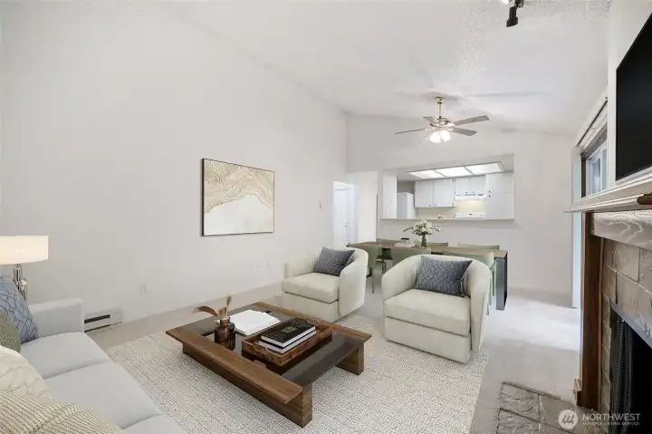 Virtually staged. Perfect space for both relaxing and entertaining.